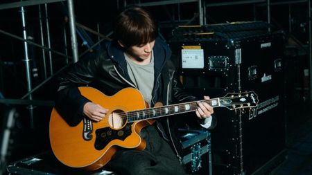 Lee Seung Yoon with his signature guitar
