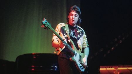 Paul McCartney performs live on stage with Wings at Ahoy on 25th March 1976 in Rotterdam, Netherlands. He plays a Rickenbacker 4001S bass guitar