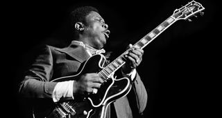B.B. King takes a solo on Lucille in this black-and-white live shot from 1974